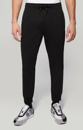 Sweatpants with rubberized patch - BLACK | Bikkembergs