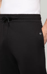 Sweatpants with rubberized patch - BLACK | Bikkembergs