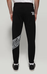 Men's sweatpants with diagonal print - BLACK | Bikkembergs