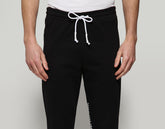 Men's sweatpants with diagonal print - BLACK | Bikkembergs