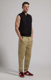 Sleeveless men’s jacket with all-over lettering - BLACK | Bikkembergs