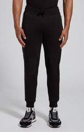 Men's black cotton sweatpants with ergonomic details - Full Price | Bikkembergs