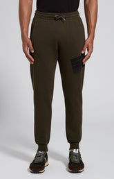 Men's green cotton sweatpants with contrast print - Full Price | Bikkembergs
