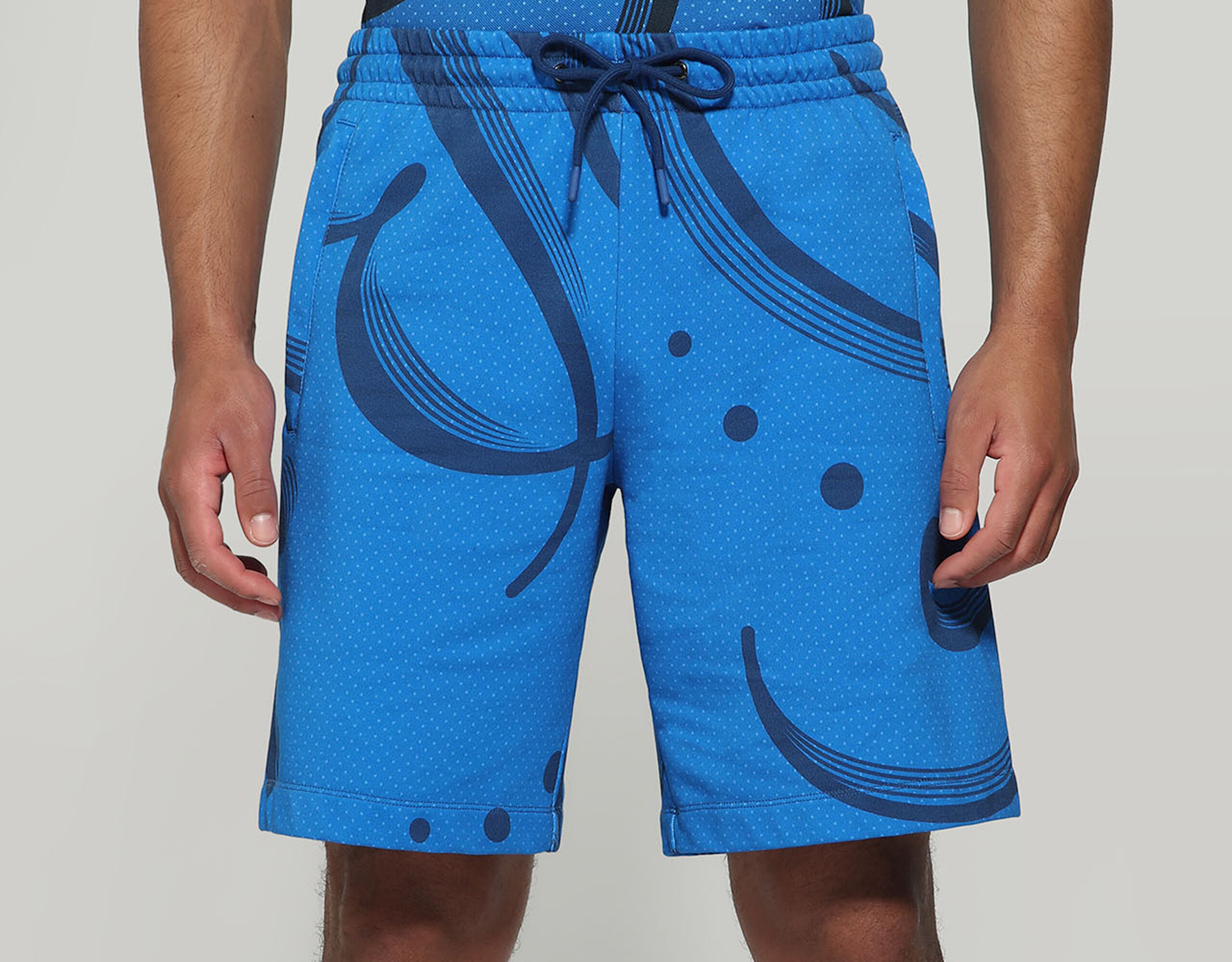 Men's Blue bermuda shorts all-over print | Bikkembergs