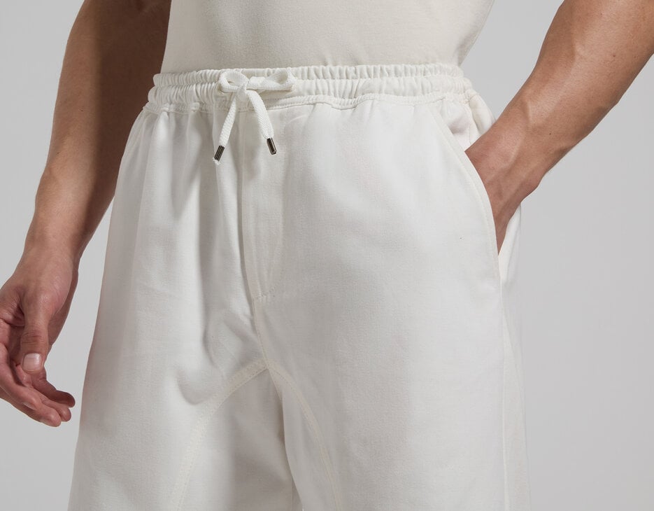 Curved-leg joggers for men, CLOUD DANCER Curved-leg joggers for men, CLOUD DANCER, hi-res-1