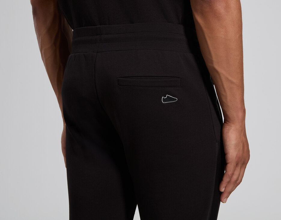 Men's black cotton sweatpants with ergonomic details, BLACK, hi-res-1