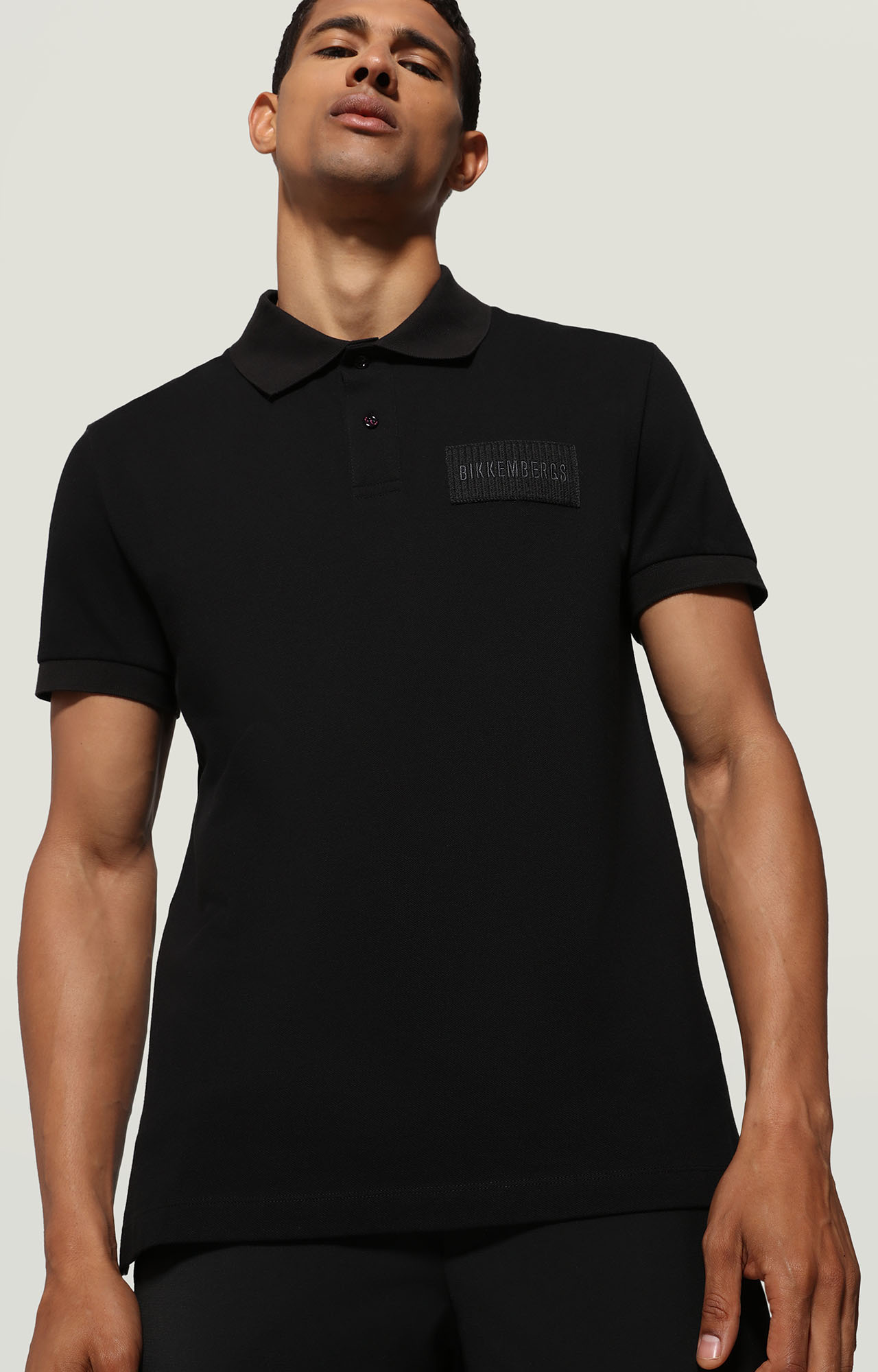 atómico Objeción despensa Men's short sleeved polo shirt | BLACK | Bikkembergs