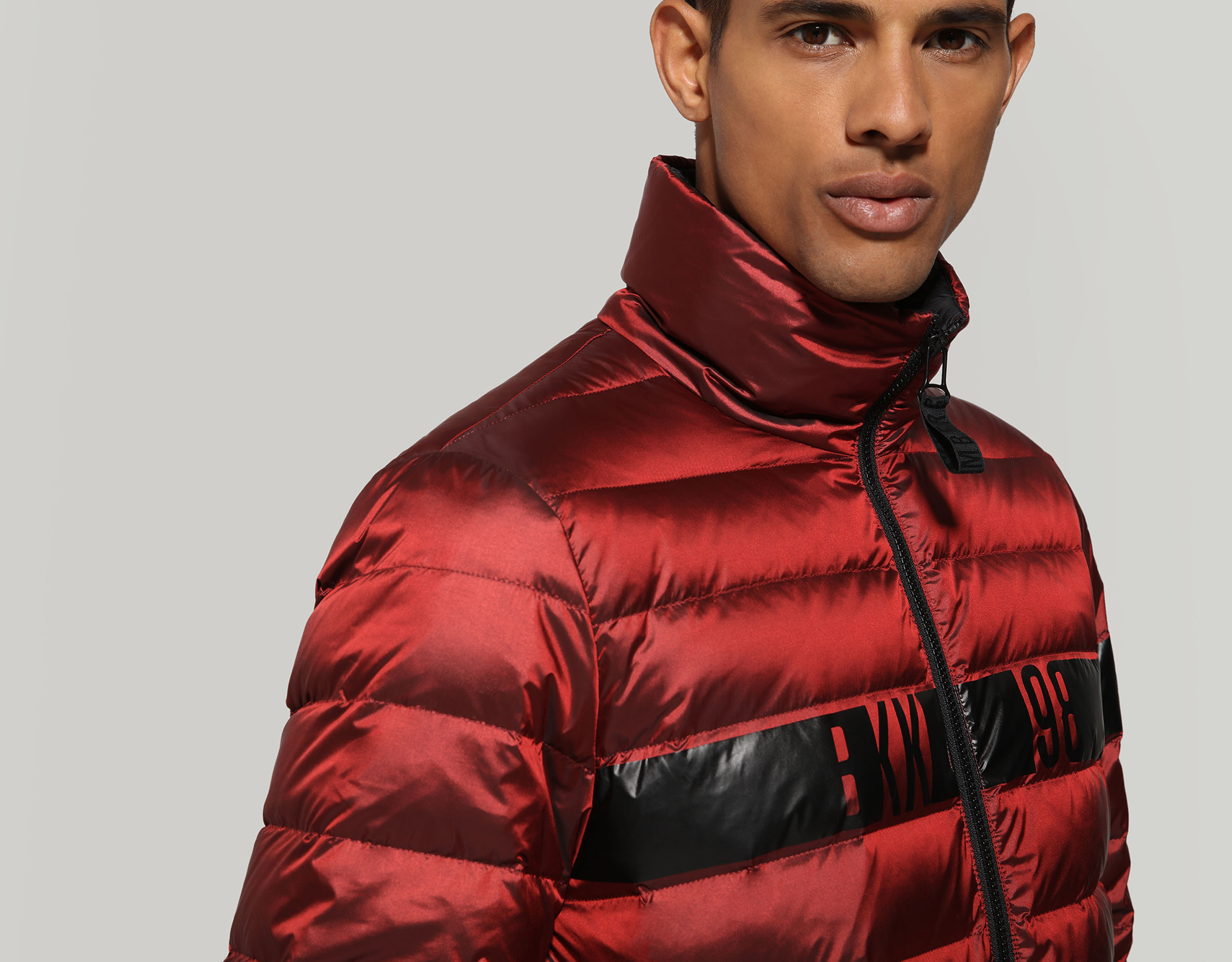 Red Men's puffer jacket quilted with logo | Bikkembergs